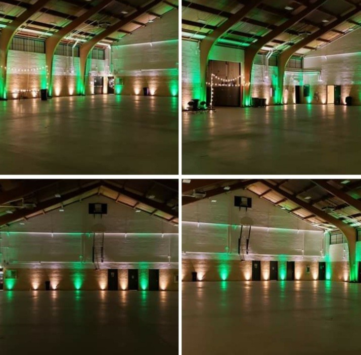 Up lighting in green and soft white at the Cloquet Armory with a wedding.