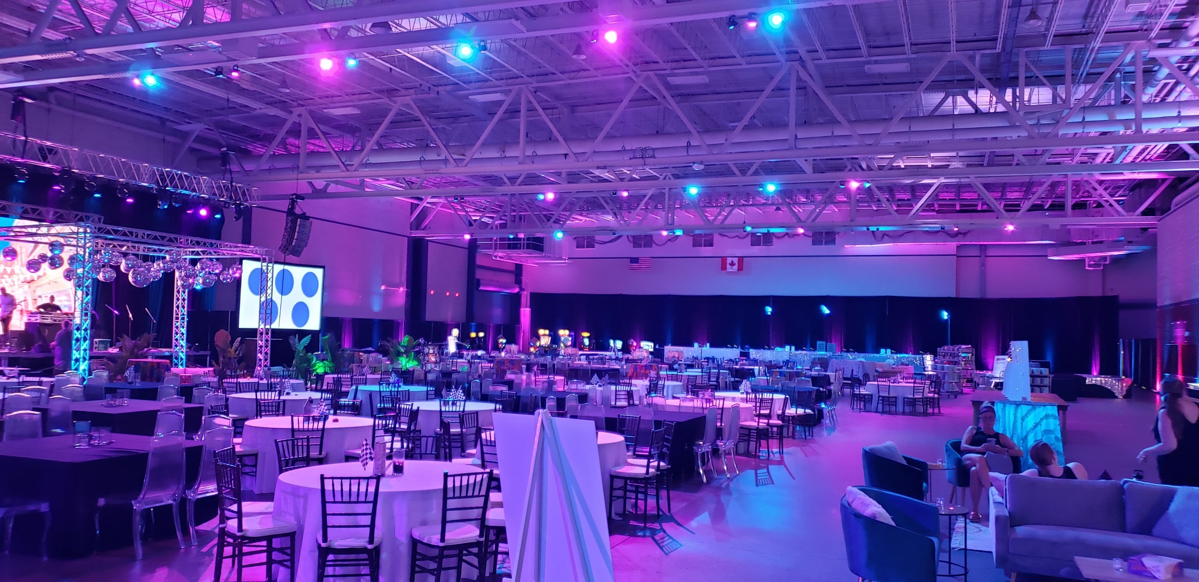 Event Lighting in pioneer Hall by Duluth Event Lighting.teal and magenta  up lighting, gobos on the walls,chandeliers provided by Duluth Event Lighting.