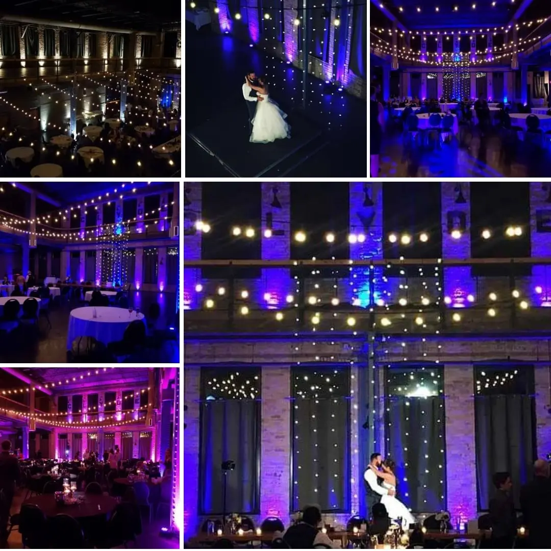 Up lighting in blue with a wedding bistro backdrop at the Clyde Iron Works
