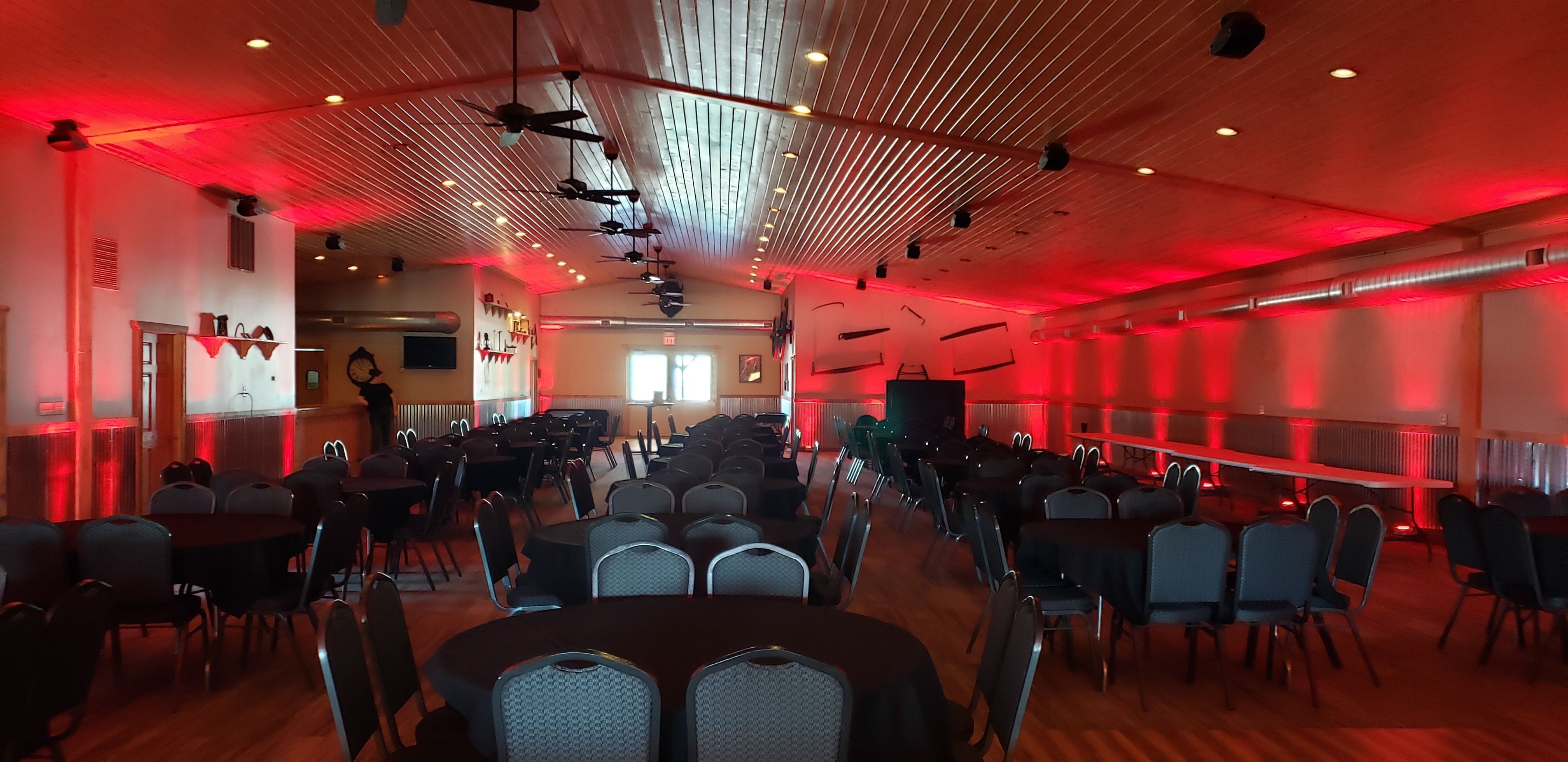 Up lighting in red at the Buffalo House for a wedding