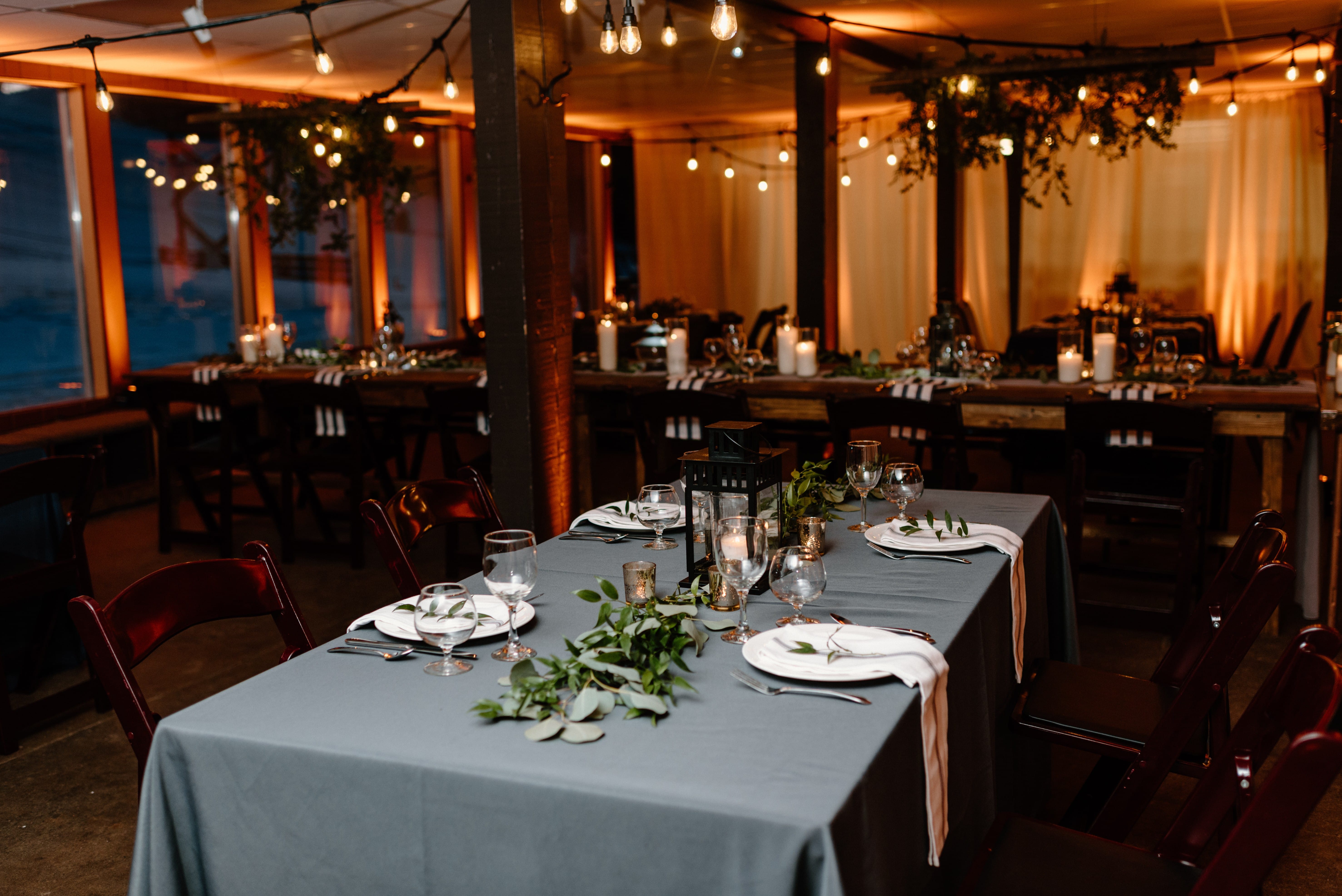 Wedding lighting at Mont Du Lac with amber up lighting and bistro.