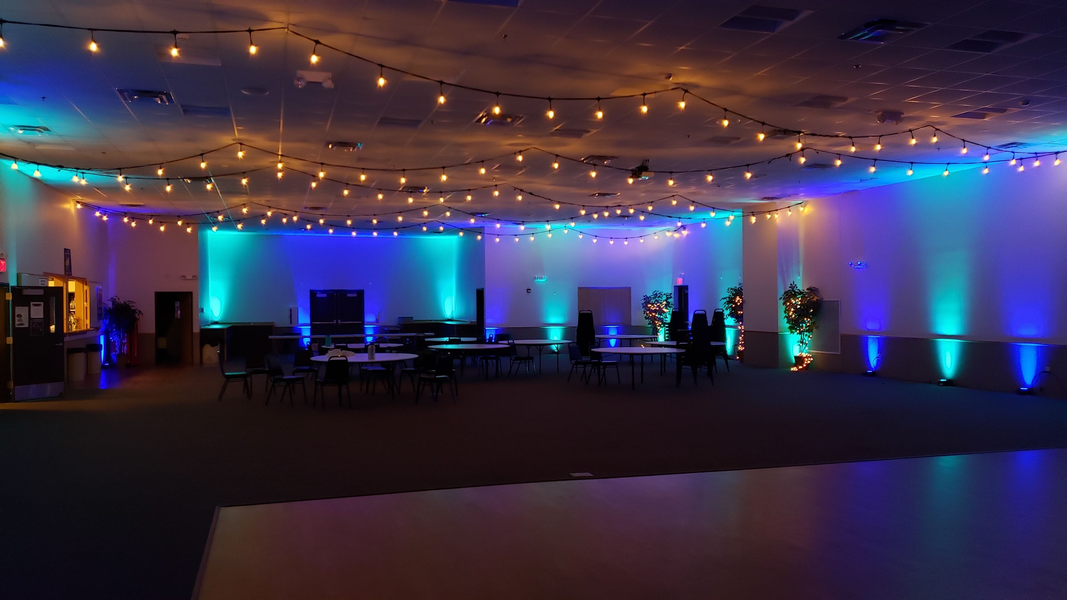Wedding lighting at the AAD Shrine by Duluth Event lighting with our outdoor bistro on the ceiling