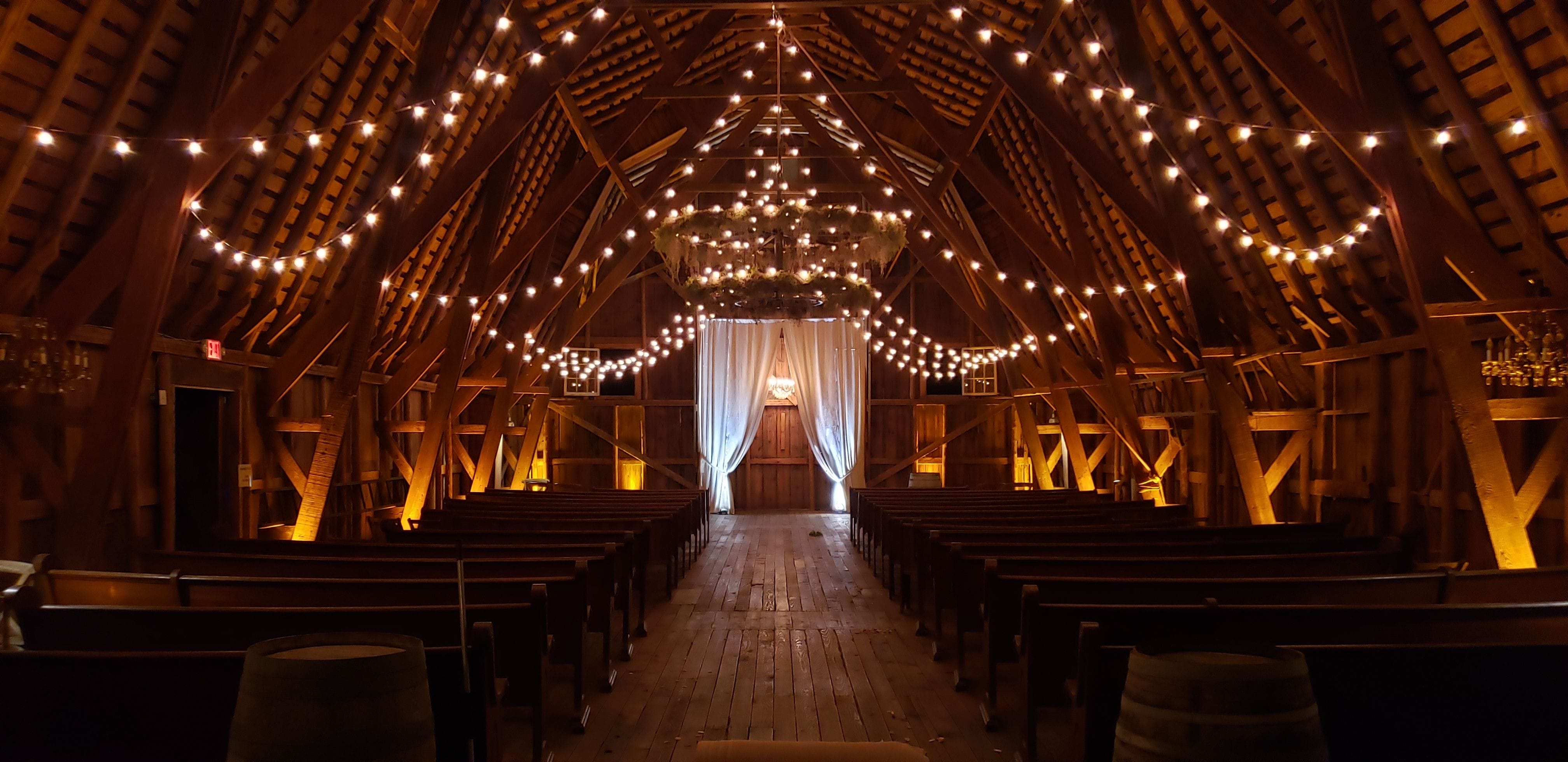 The Grainary wedding lighting in amber by Duluth Event Lighting