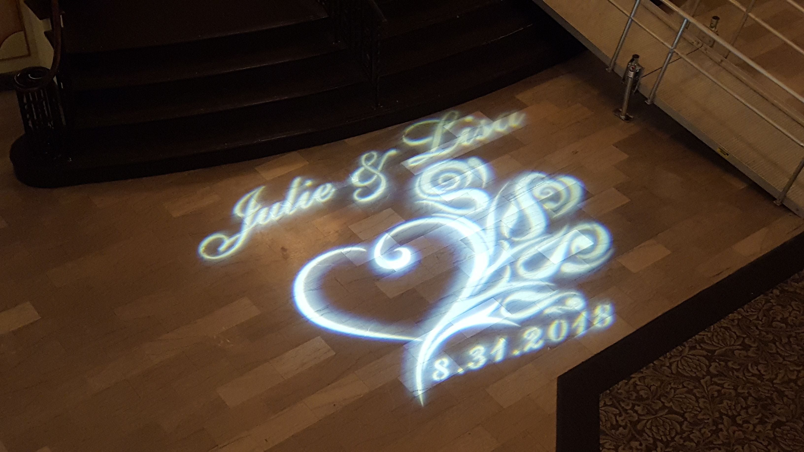 Wedding monogram at the base of the steps leading into the Moorish Room.