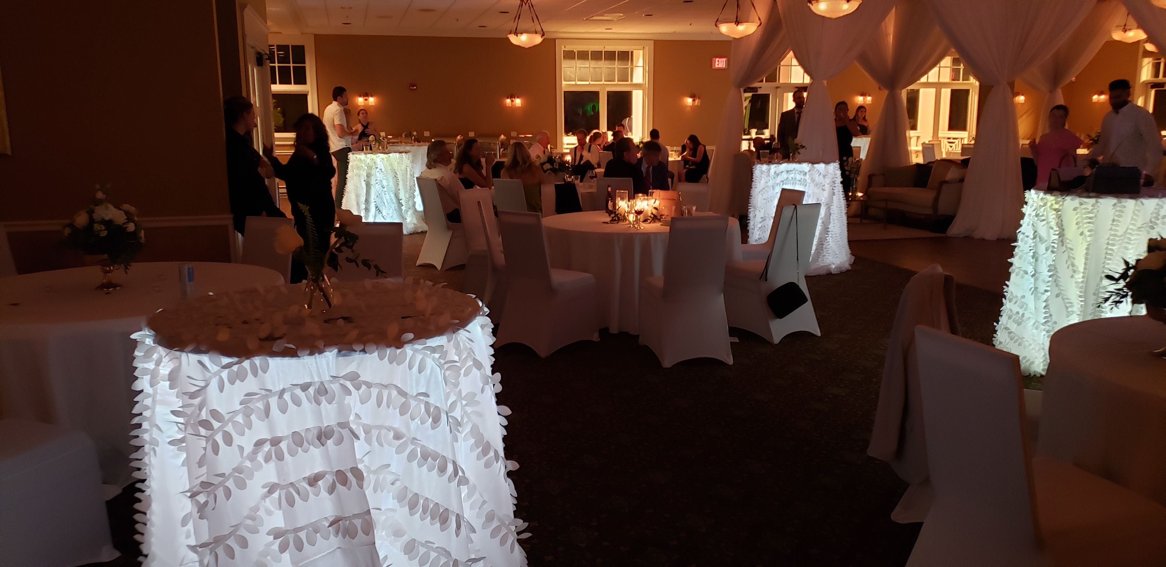 white glowing cocktail tables at Northland Country Club.