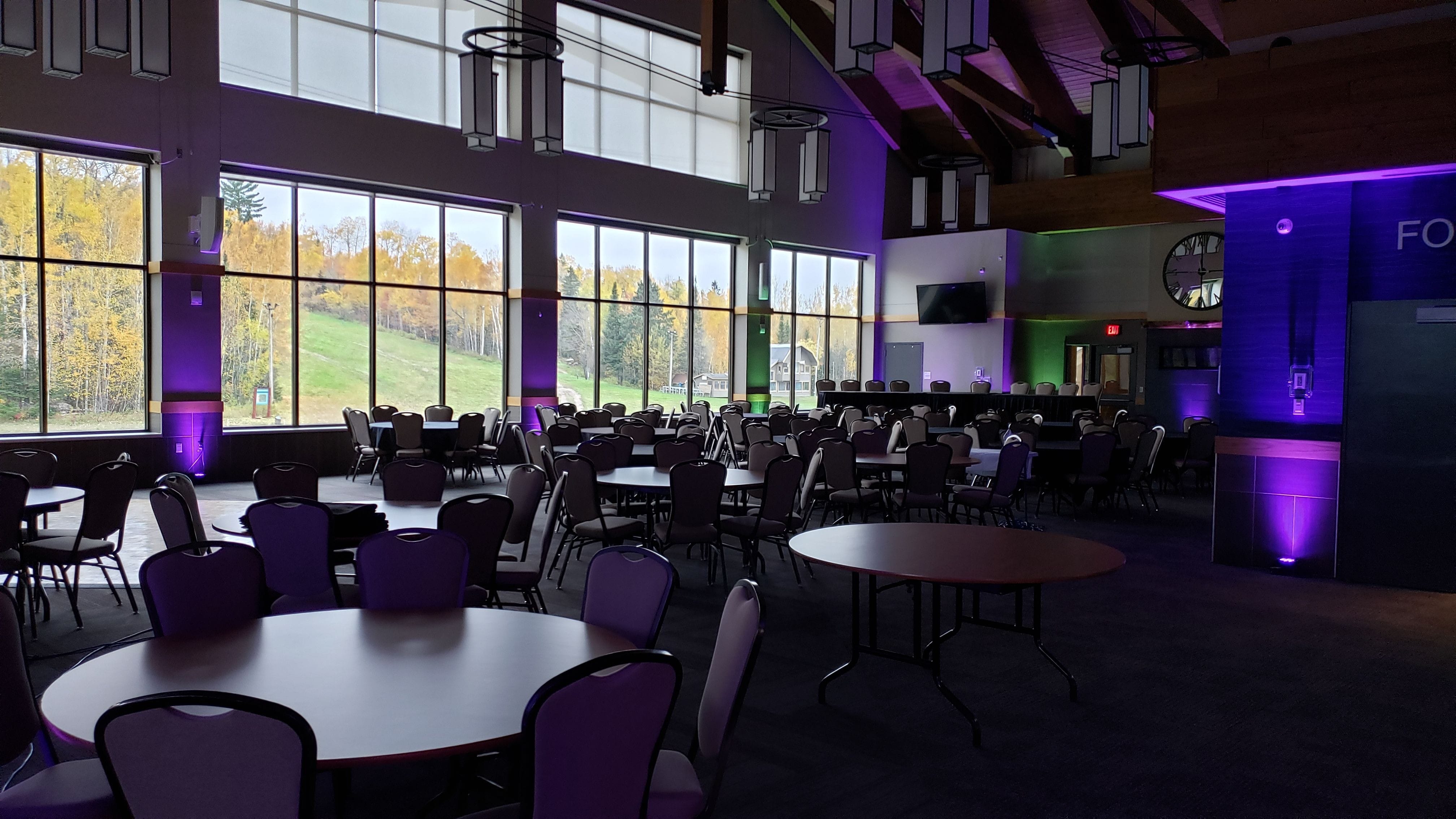 Up lighting in green and purple by Duluth Event Lighting at Giants Ridge